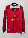 Manchester United 1996/97 local manga larga